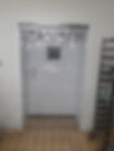 High angle view of an industrial freezer area with freezer curtains