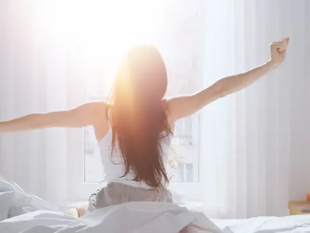 Brunette women waking up with great sleep and eye health