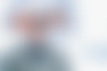 Elderly man undergoing eye examination before private cataract surgery with iSIGHT Private.