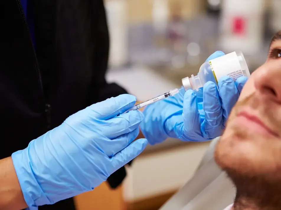 Man having cosmetic eye surgery Lancashire