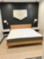 Bedroom pendant lights installed above floating nightstands by Smart Choice Electric
