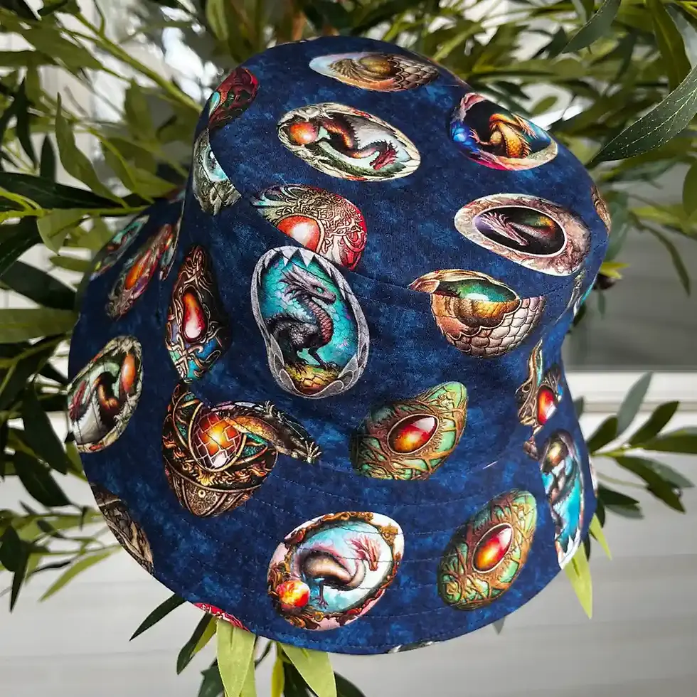 Dark blue bucket hat featuring beautifully detailed dragon eggs.