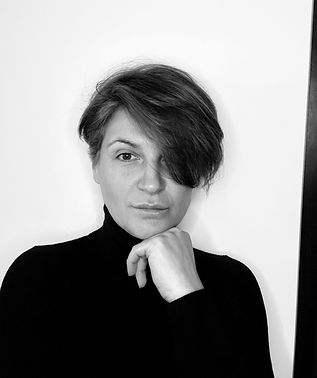 Viktoria, founder of Vivere Voyage and independent travel agent, smiling confidently