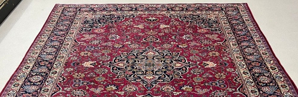 Thumbnail: This Persian rug features a beautifully detailed pattern on a ruby red background, indigo blue borders.
