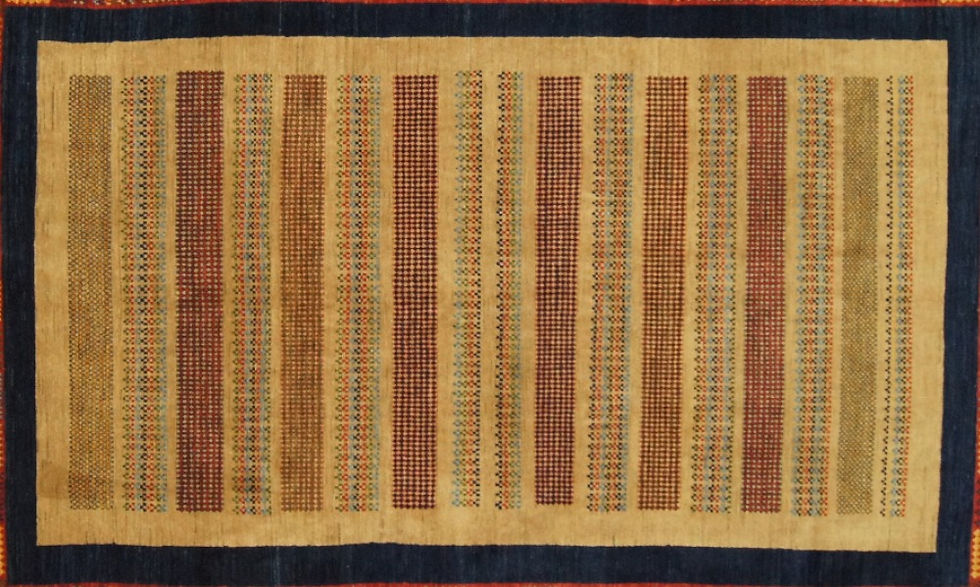 Thumbnail: Introduce a stunning, hand knotted Persian Gabbeh rug that will add a touch of sophistication to any room.