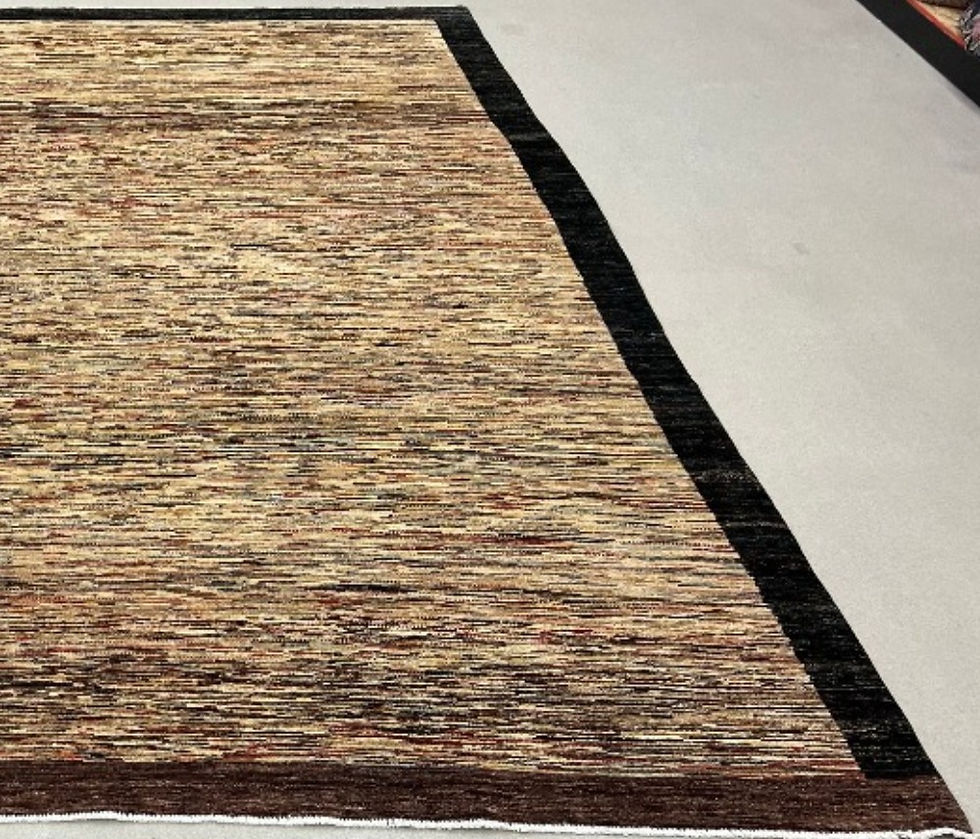 Thumbnail: This oriental rug features a signature Gabbeh design in beautiful brown colors.