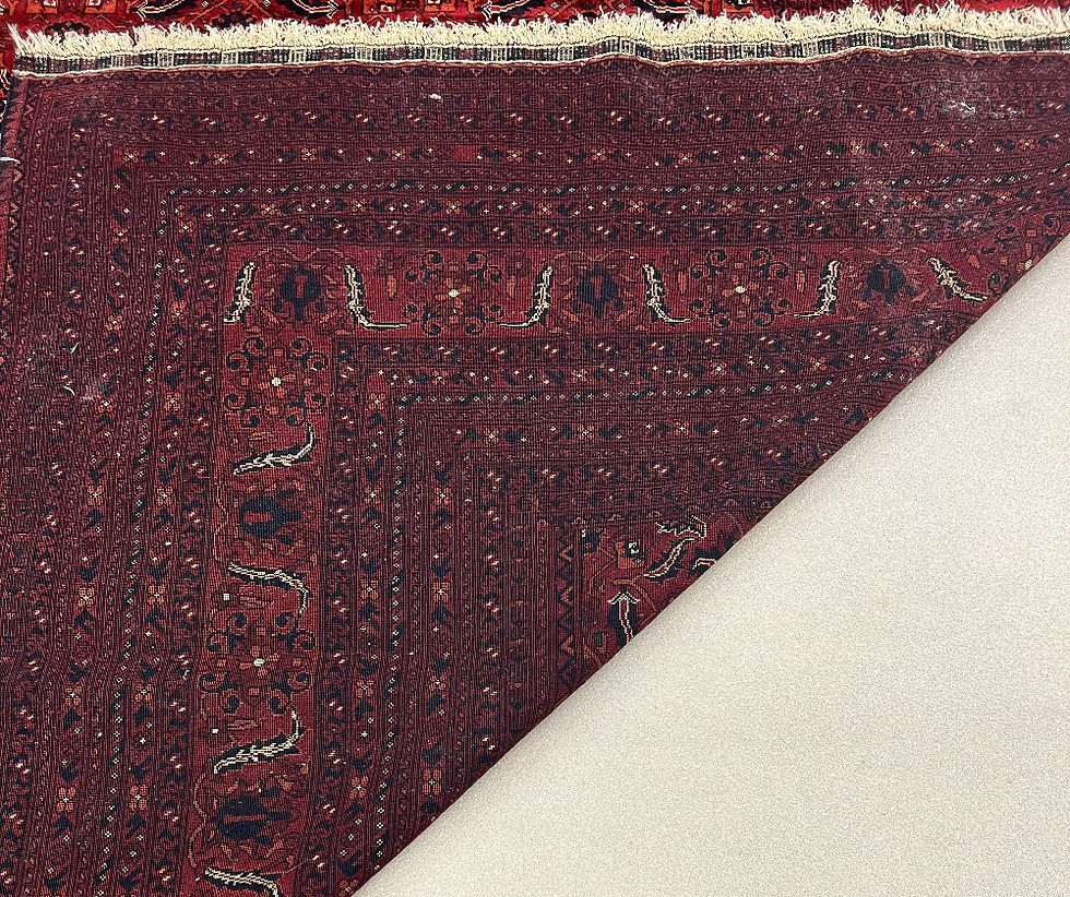 Thumbnail: Afghan Ansari rug. This Afghan rug features an elaborate pattern in a gorgeous burgundy color.