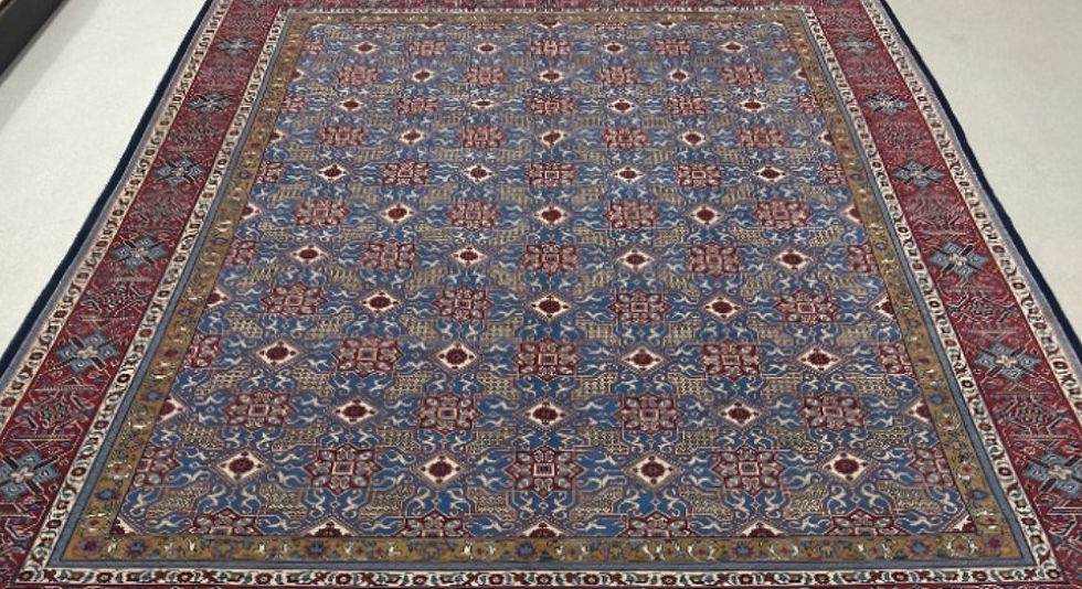 Thumbnail: This Persian rug features a beautiful geometric design in soft blue and red colors.