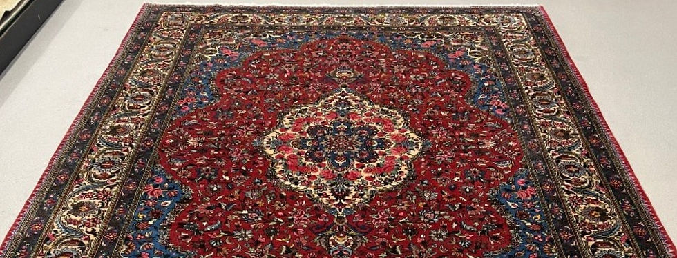 Thumbnail: This Persian rug features a luxurious pattern in gorgeous red, blue and ivory colors.