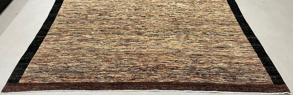 Thumbnail: This oriental rug features a signature Gabbeh design in beautiful brown colors.