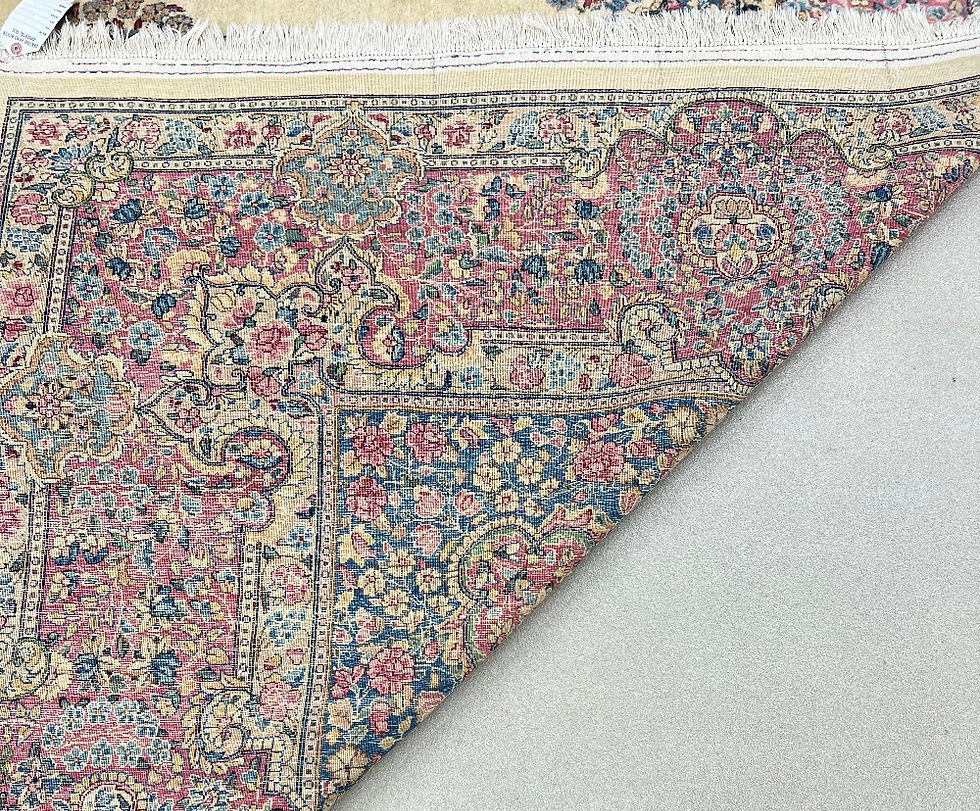 Thumbnail: This Antique Persian rug features a stunning medallion design on ivory background with blush borders.