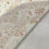 Thumbnail: This India rug features elegant floral pattern in cream color.