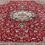 Thumbnail: This Persian rug features a stunning medallion motif on a red background, dark borders.