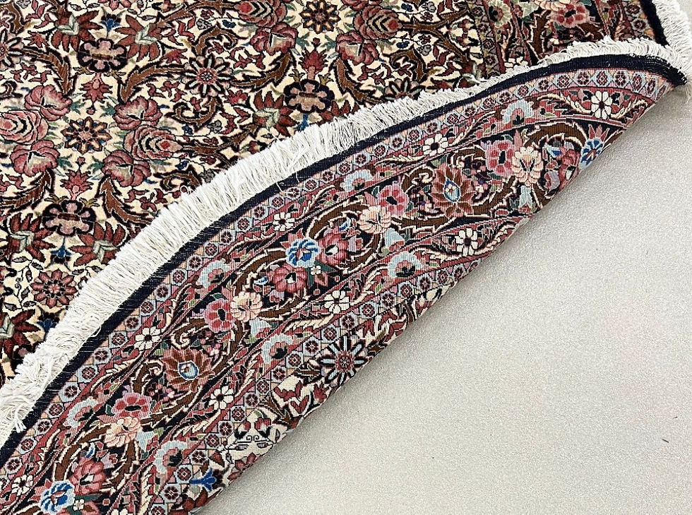 Thumbnail: This Persian rug features elaborate floral design, cream background, brown borders.