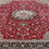 Thumbnail: This Persian rug features a stunning medallion motif on a red background, dark borders.