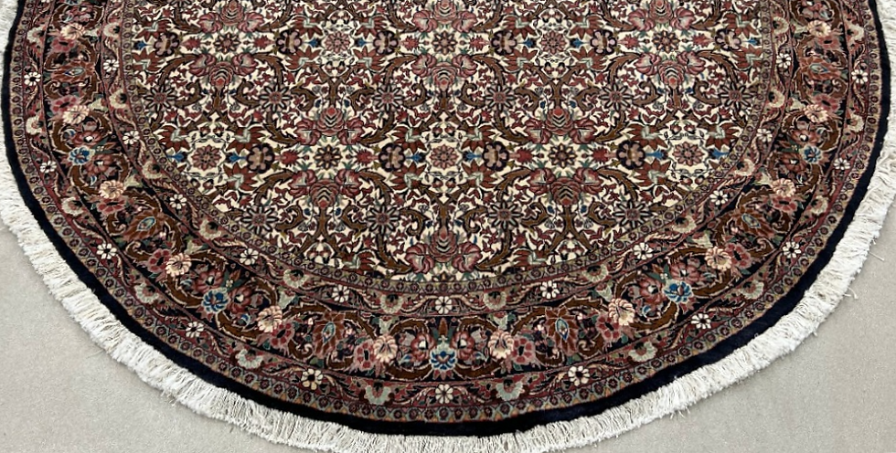 Thumbnail: This Persian rug features elaborate floral design, cream background, brown borders.
