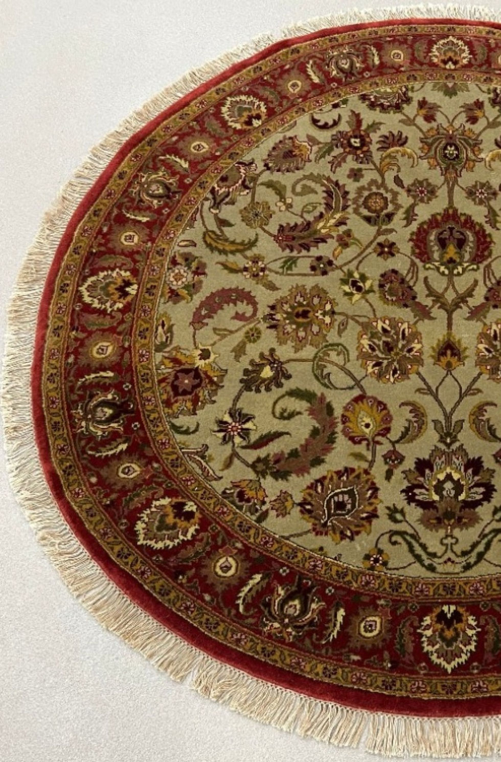 Thumbnail: This India rug features beautiful floral design, green background, red borders.