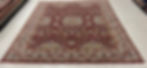 India rug. This Oriental rug features a stunning Persian Tabriz design.