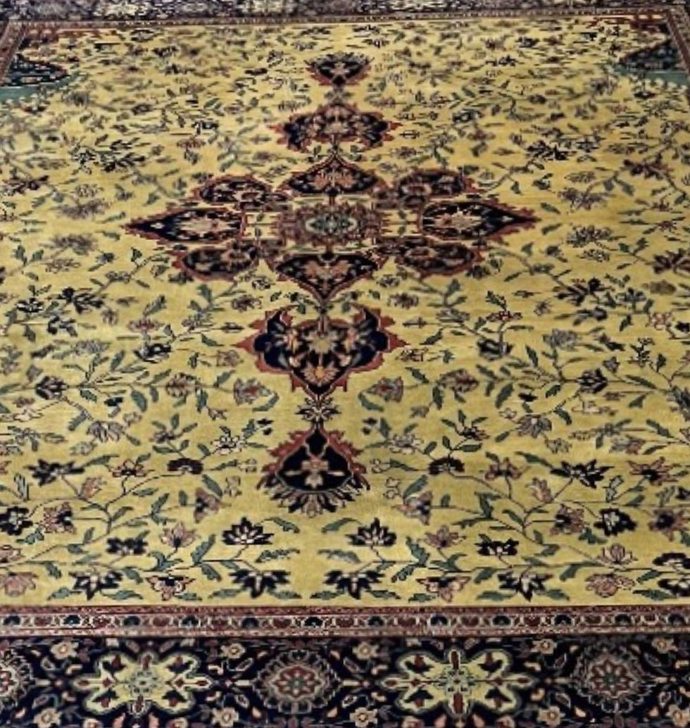 Thumbnail: This Oriental India rug features a striking medallion motif in burgundy and gold colors.