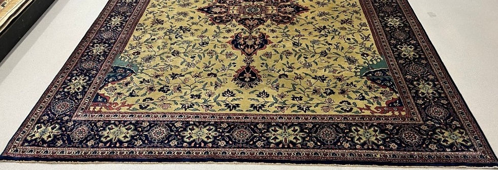 Thumbnail: This Oriental India rug features a striking medallion motif in burgundy and gold colors.