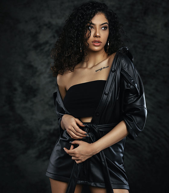 woman in black leather jacket and black skirt_edited.jpg