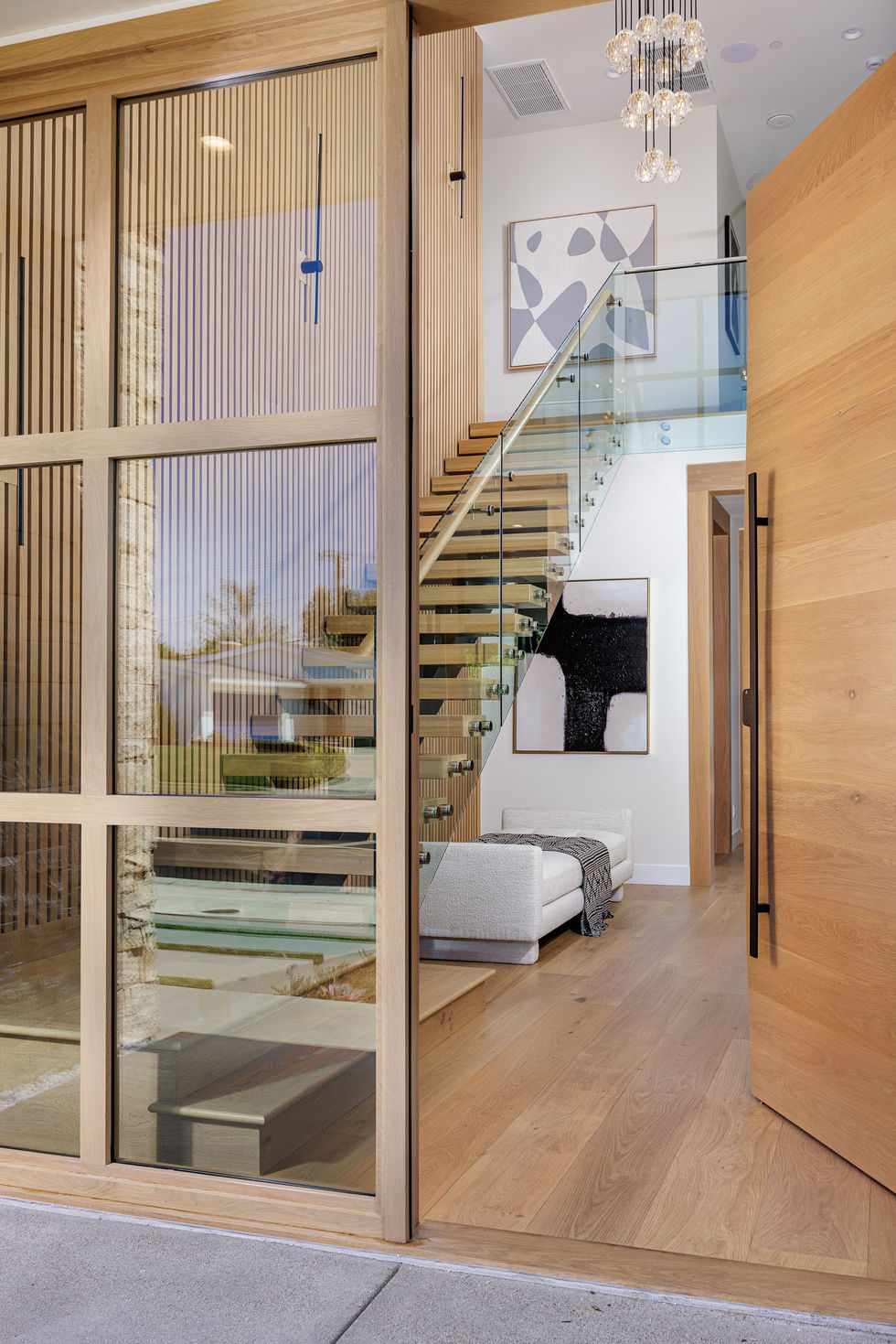 architectural detail with staircase of a glass railing