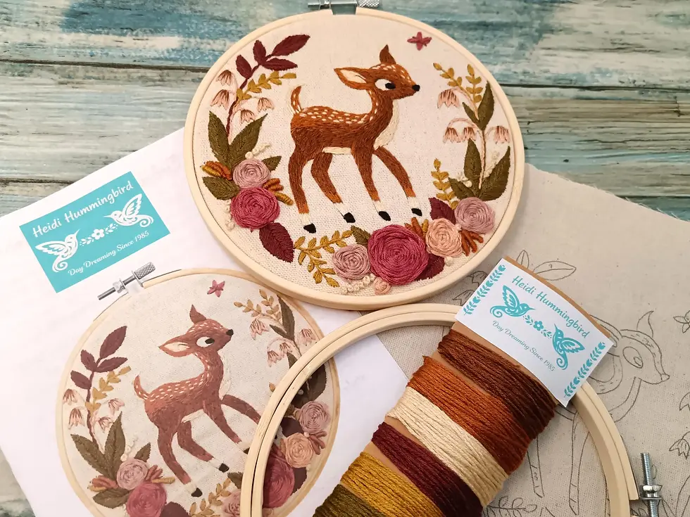 Fawn embroidery kit with woodland deer design and floral details in bamboo hoop
