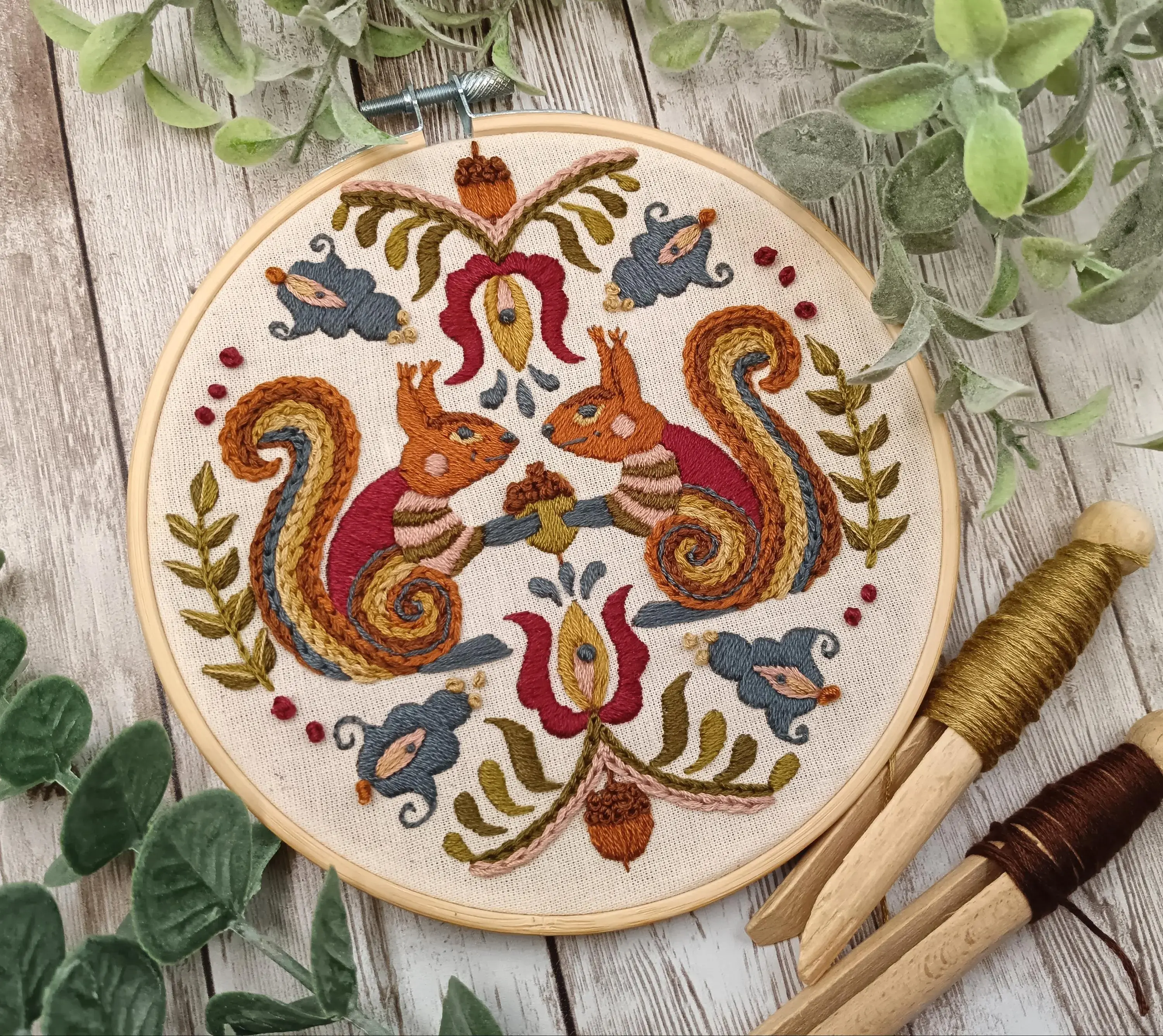 Squirrel embroidery with acorns leaves and woodland autumn details