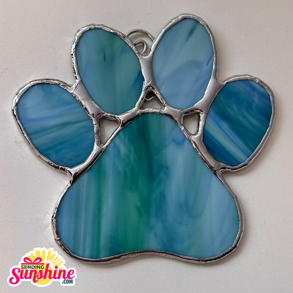 Blue stained glass dog paw print