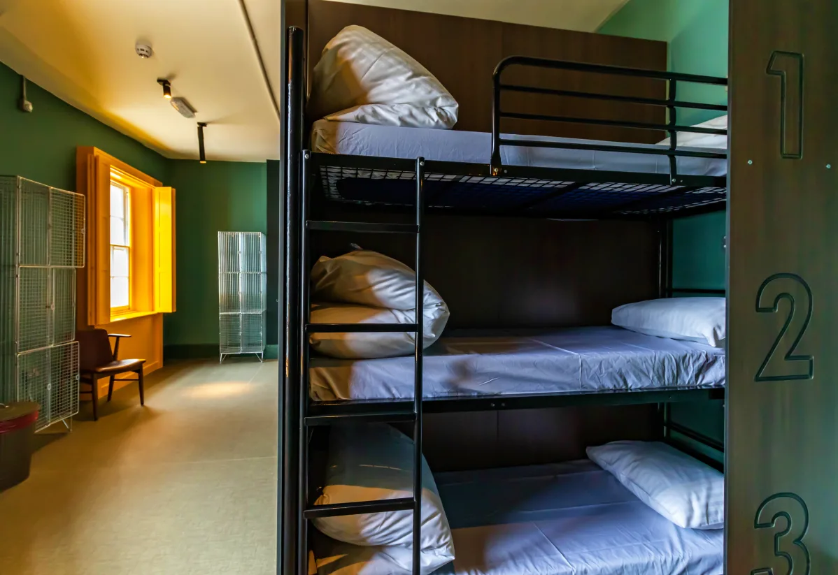 save money by staying in a hostel and share a room