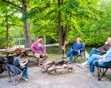 Scenic RV campground nestled in the Shenandoah mountains with spacious sites, surrounded by lush greenery and tall trees. Stay in one of our cabins or camp in a tent or RV right here at our western style dude ranch.