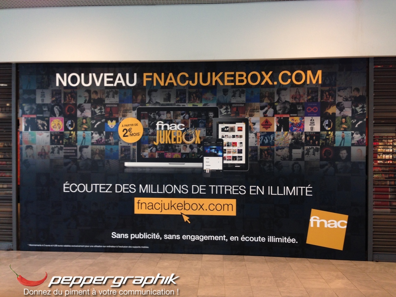 Habillage mural grand format pour la campagne Fnac Jukebox en centre commercial réalisé par Peppergraphik