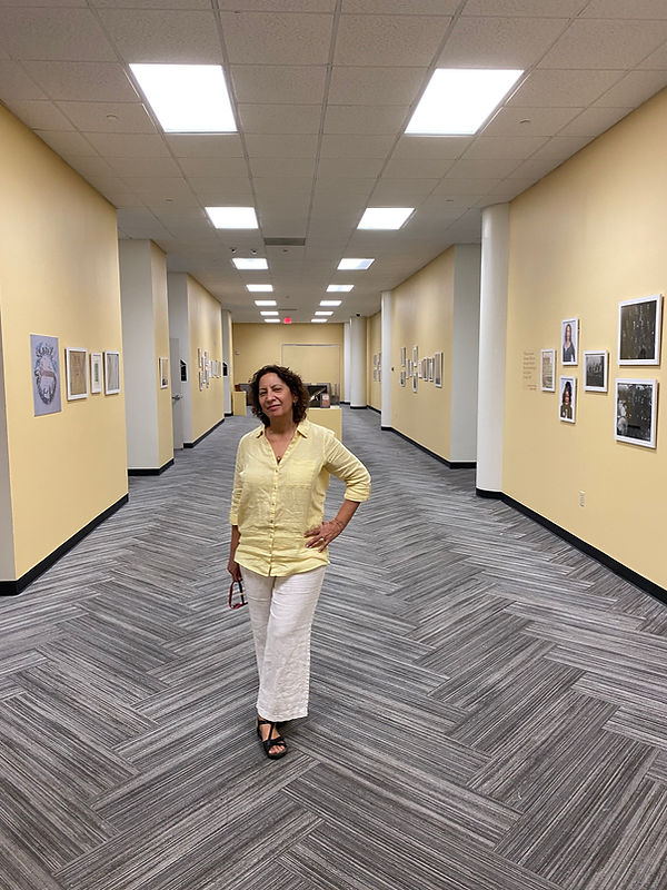 Curator Fatima Shaik at The Cultural Family of Economy Hall exhibit Summer-Fall 2023 XULA