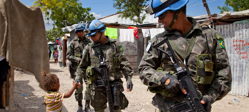 UN peacekeepers patrolling a neighborhood in Haiti as part of the United Nations Stabilization Mission in Haiti (2004–2017). Link: https://news.un.org/en/story/2013/10/452822-security-council-extends-un-peacekeeping-mission-haiti-another-year