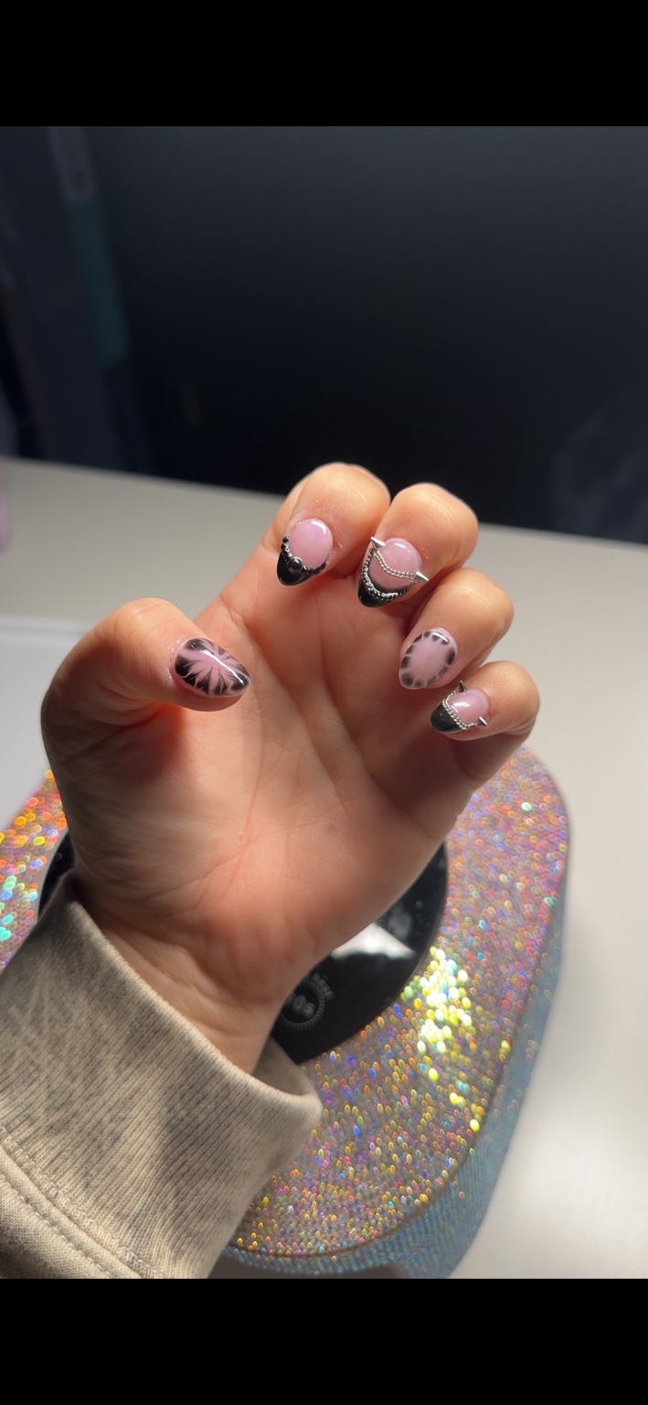 Black and pink nails with silver details by Chelsi Troxell
