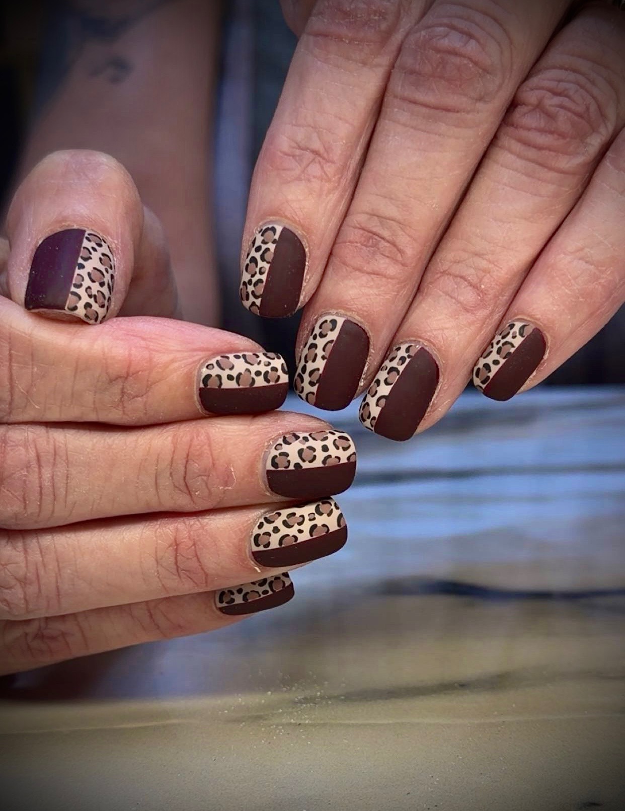Chocolate brown and leopard-print nails by Tiffany Campbell