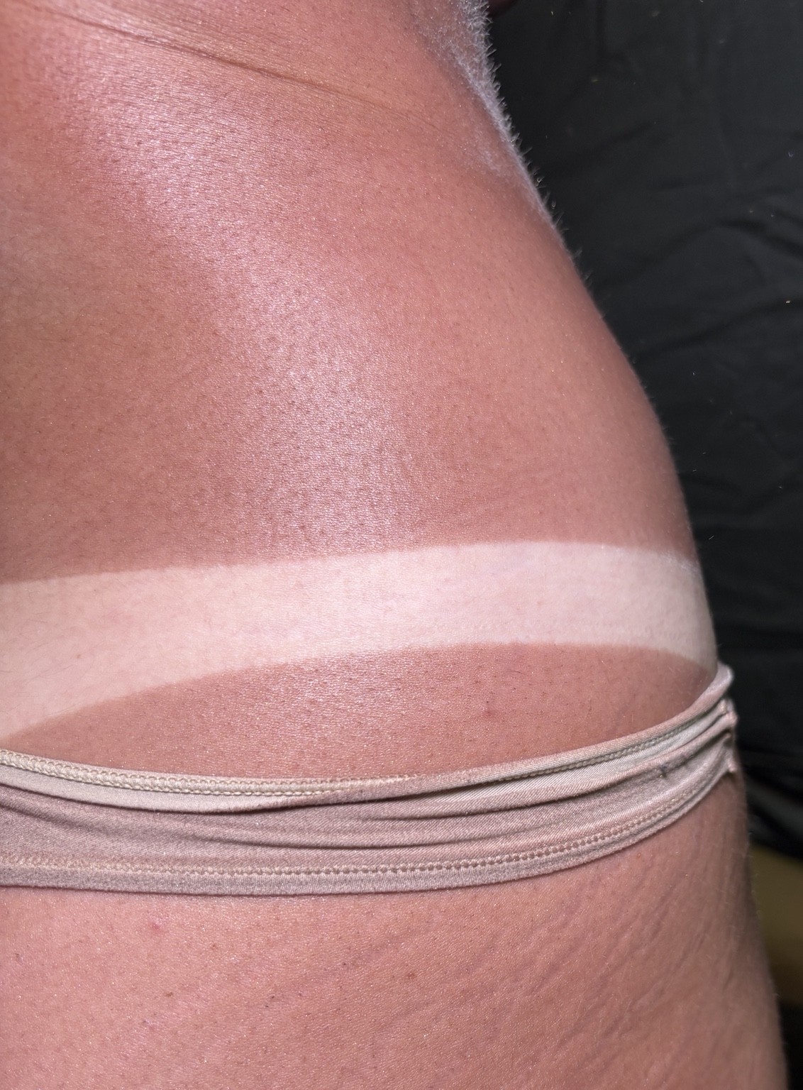 Close-up spray-tan finish by Amanda Little