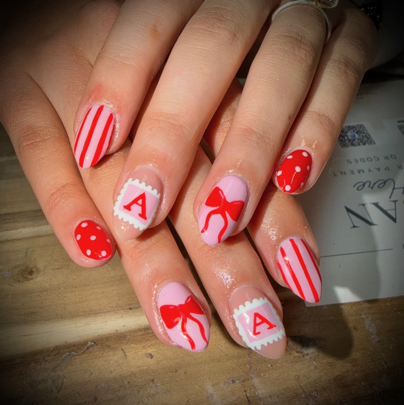 Pink and red bows with monogram accents by Tiffany Campbell