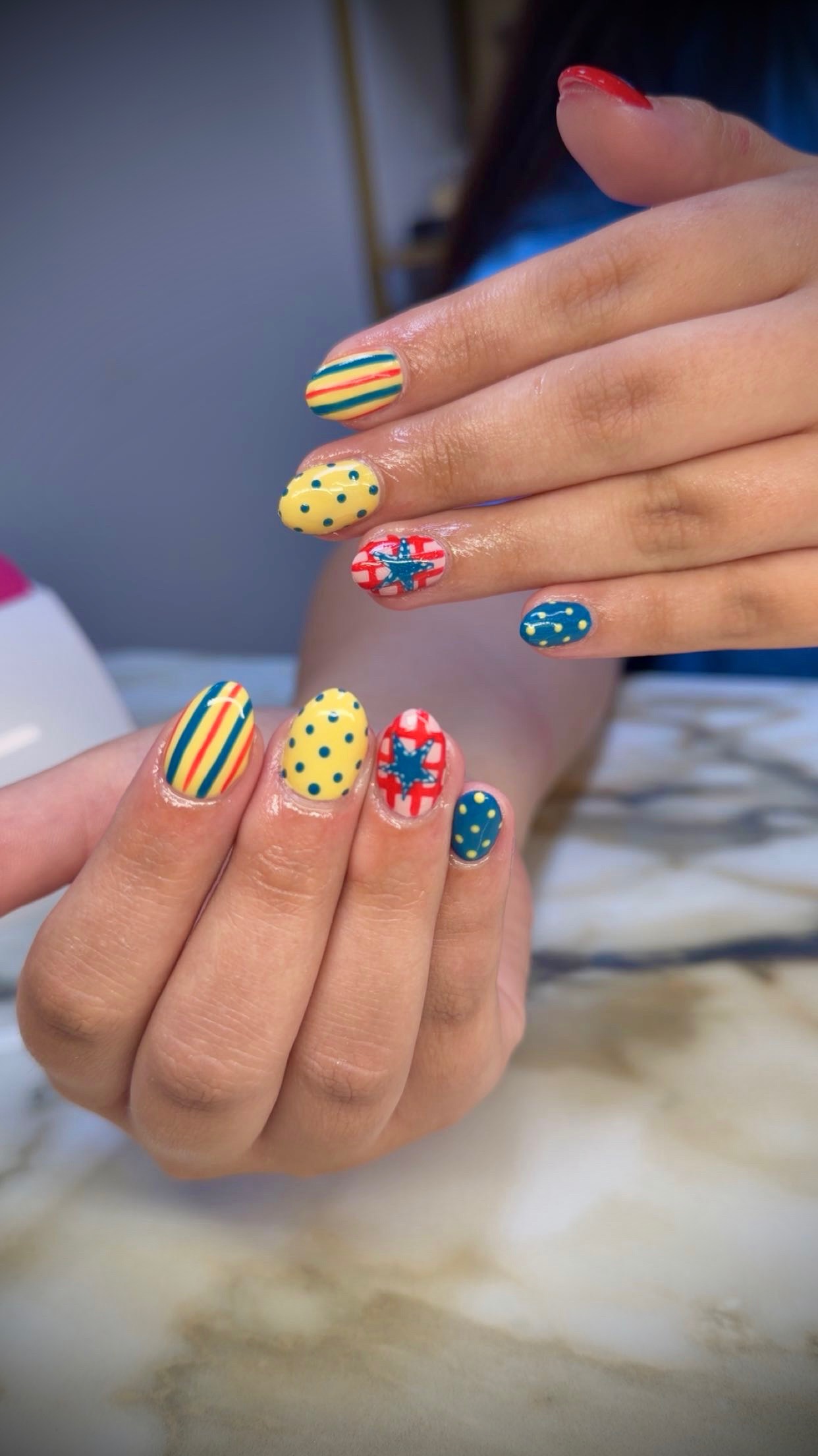Colorful nautical nail art by Tiffany Campbell