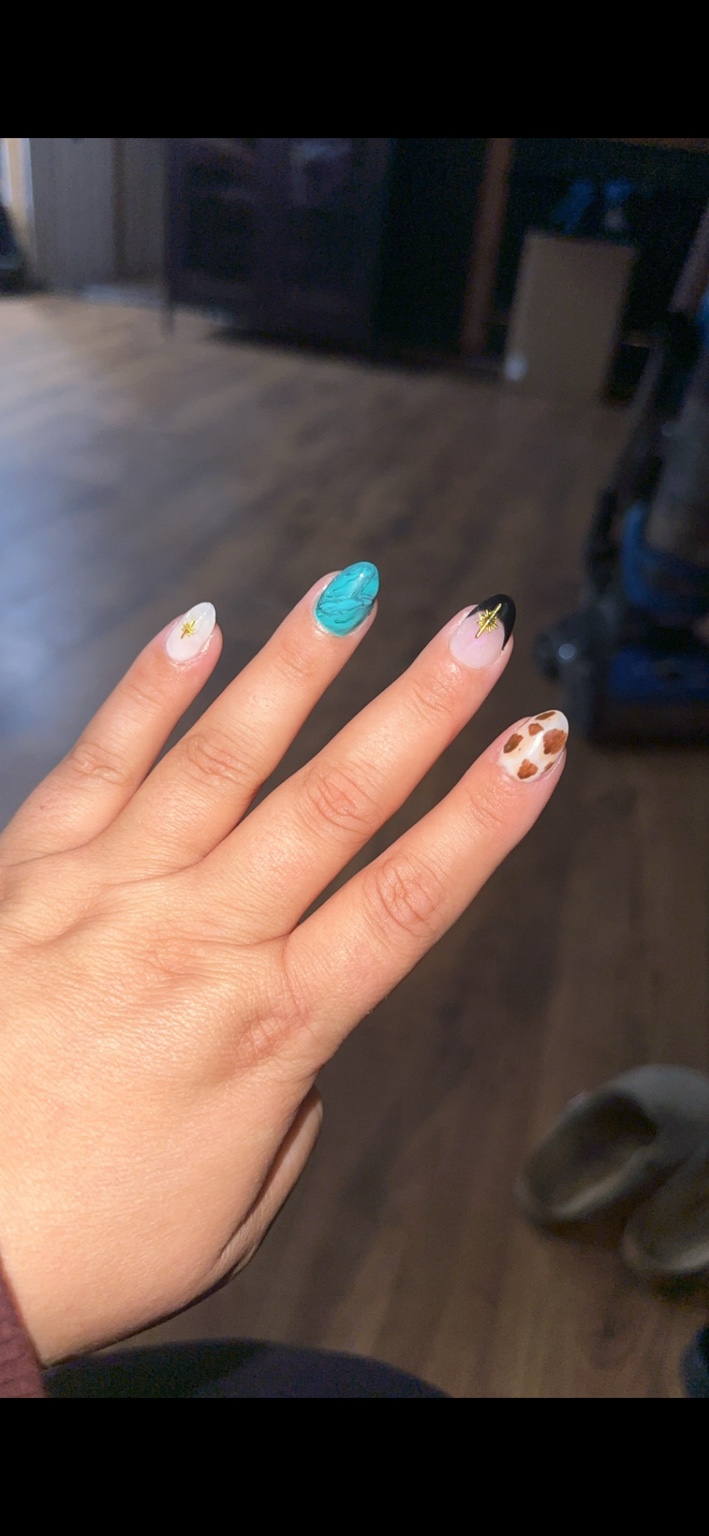 Turquoise and cow-print accents by Chelsi Troxell
