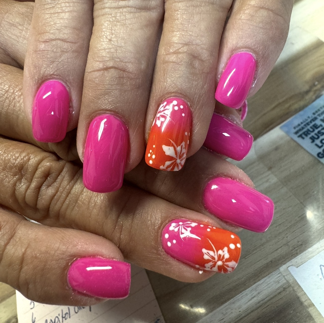 Hot pink and orange floral nails by Sherry Ball