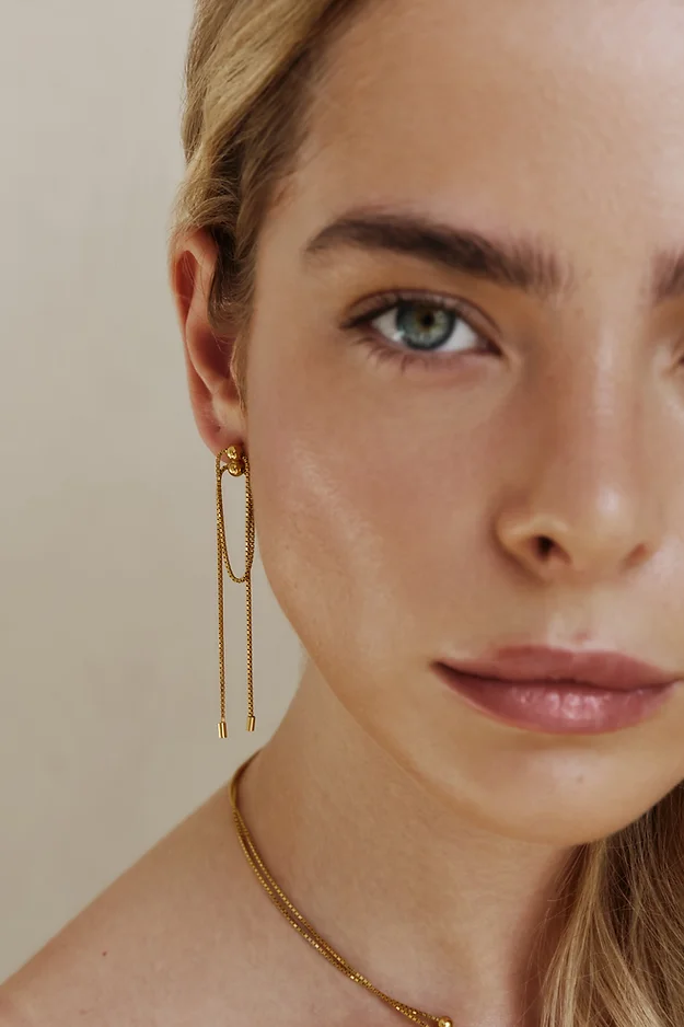 Long gold transforming earrings