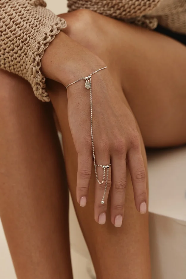 Silver bracelet with ring and size adjusters