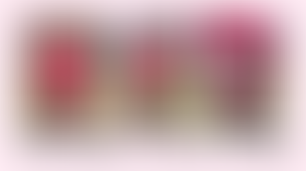 girl wearing floral skirt and coral sweater