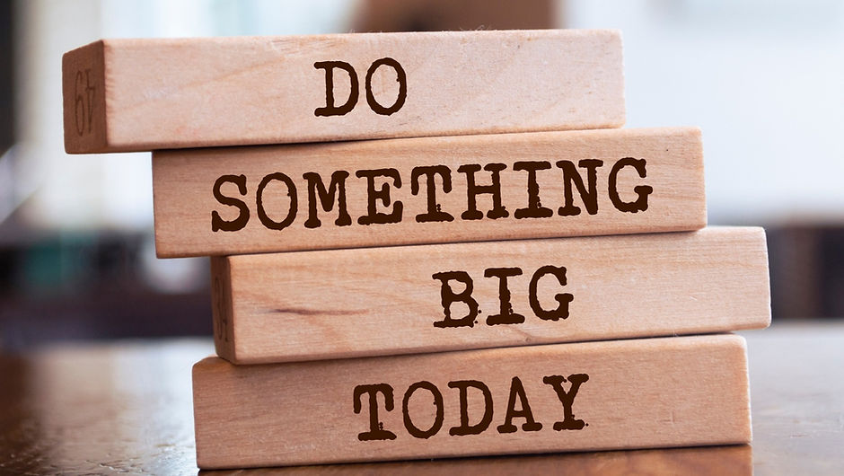 Wooden blocks with words 'Do Something Big Today'
