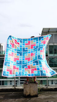 colour oriental lattice quilt waving in the wind