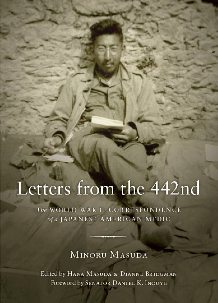 Minoru writing to his wife, Franklin's sister, and his book of letters