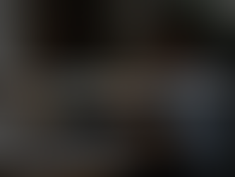 Businessman comparing insurance providers at home