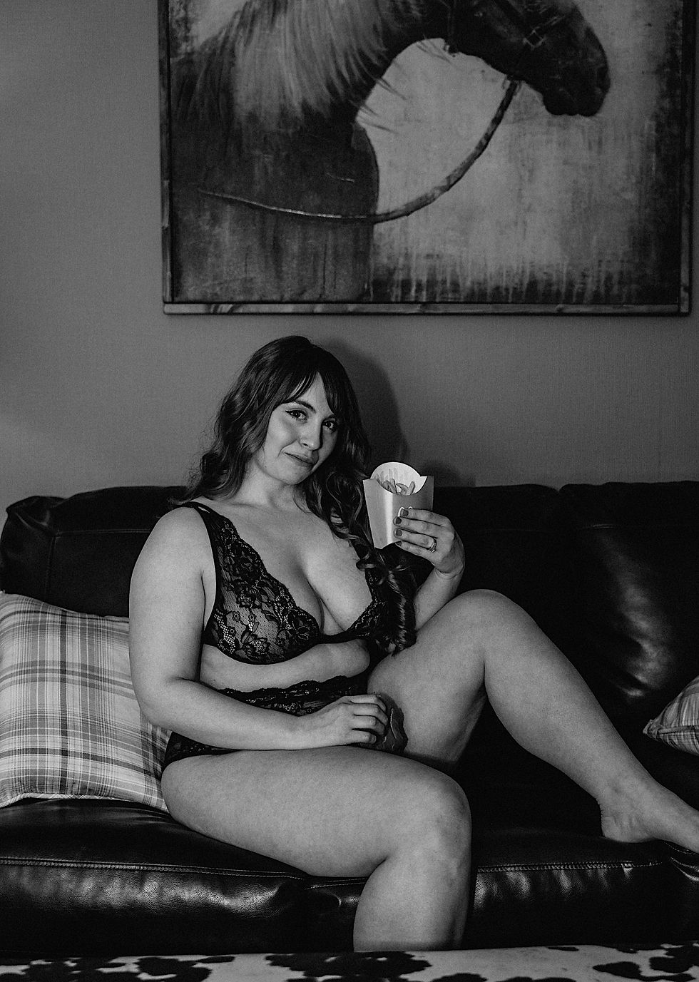Model eats McDonalds on couch during boudoir session