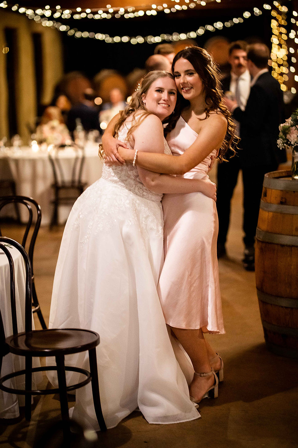 bride and bridesmaid candid portraits
